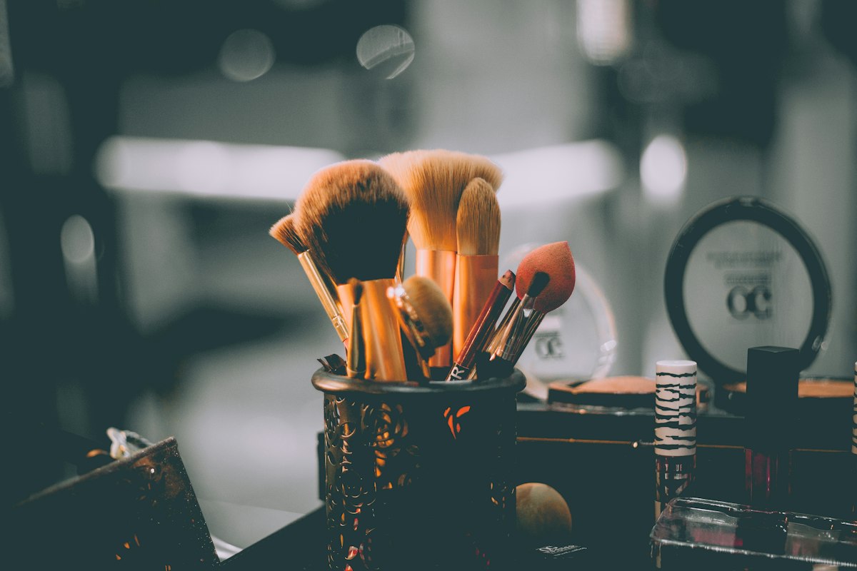 Beauty tools arranged at an artist's station